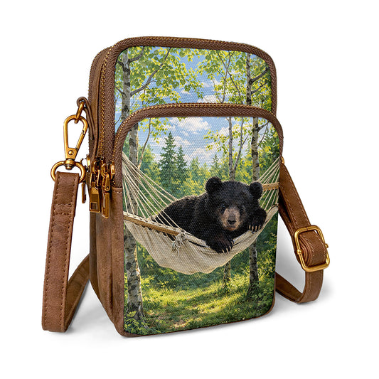 Slumbering cellphone bag brings playful bear charm