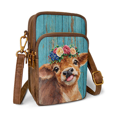 Highland Cow cellphone bag shows floral bouquet